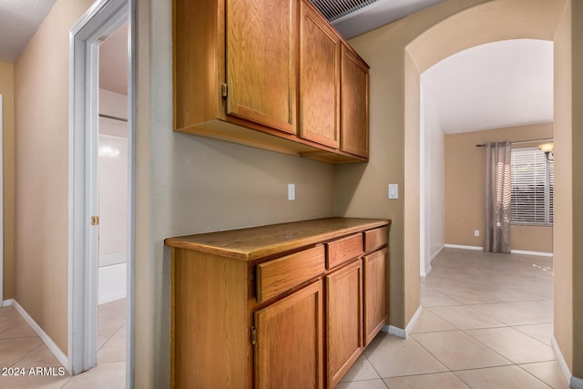 interior space featuring light tile patterned flooring