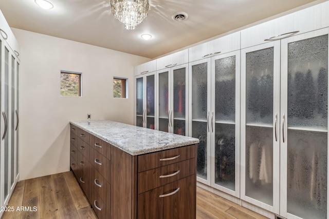 39602 N Charles Blair Macdonald Rd, Scottsdale, AZ 85262 - spacious closet featuring wood finished floors
