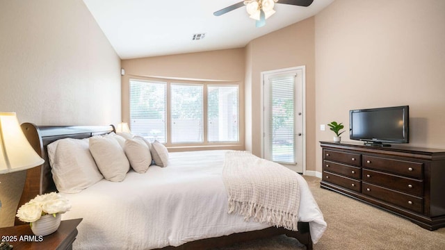 carpeted bedroom with ceiling fan, access to exterior, and lofted ceiling