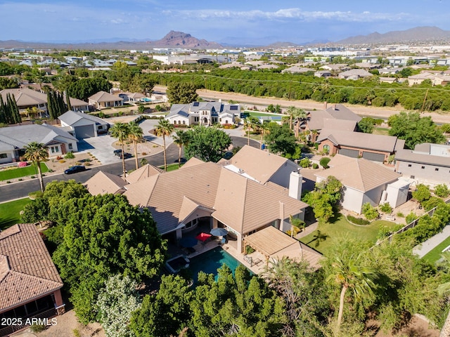 bird's eye view with a residential view and a mountain view
