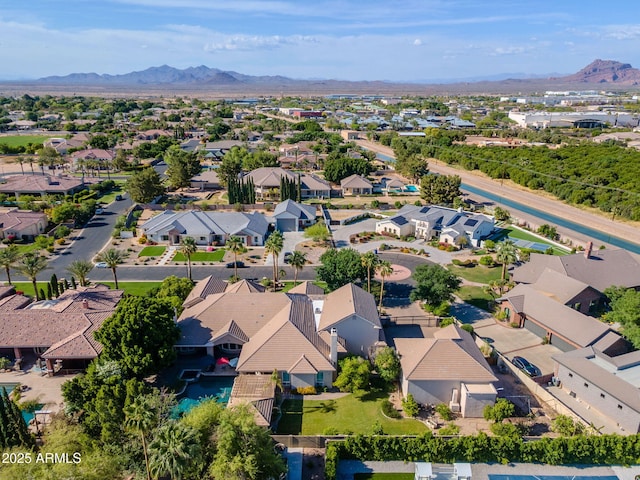 drone / aerial view with a residential view and a mountain view