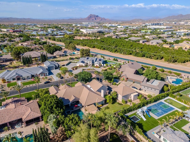 birds eye view of property with a residential view and a mountain view