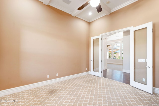 spare room with ceiling fan, french doors, beam ceiling, and carpet floors