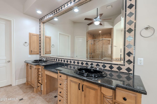 bathroom with ceiling fan, visible vents, a shower stall, tile patterned flooring, and backsplash