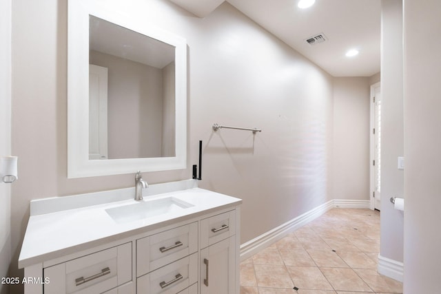 bathroom with vanity, visible vents, recessed lighting, tile patterned flooring, and baseboards