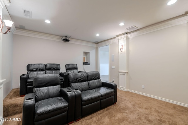 carpeted home theater room featuring ornamental molding, visible vents, and recessed lighting