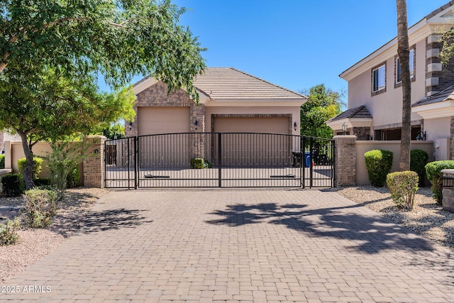 view of gate with fence