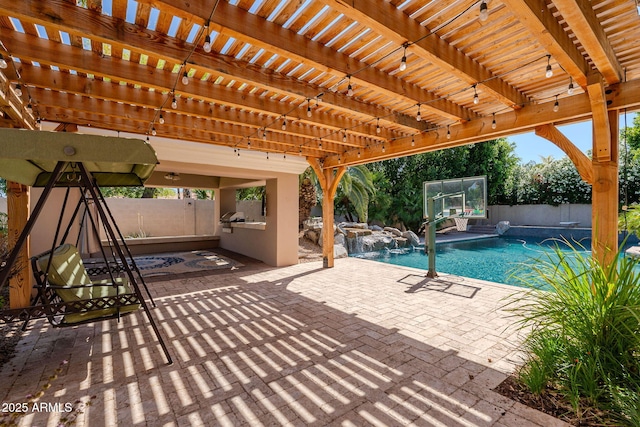 outdoor pool featuring a fenced backyard, a pergola, a patio area, and area for grilling