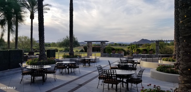 view of patio / terrace with a mountain view