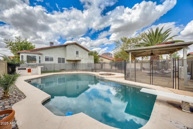 view of swimming pool with a patio, a fenced backyard, a fenced in pool, and a hot tub