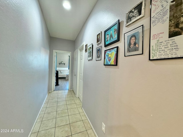 hallway featuring light tile patterned floors