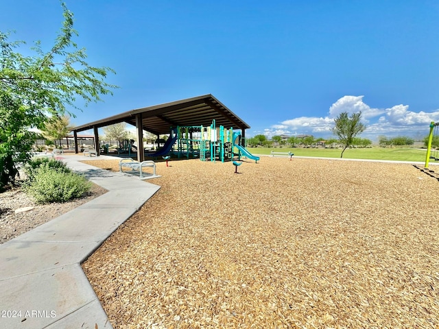 view of property's community with a playground