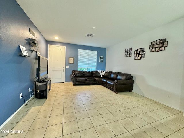 living room featuring light tile patterned flooring