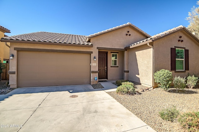 view of front of home with a garage