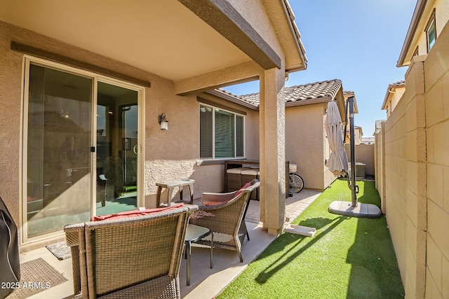 view of patio featuring central air condition unit