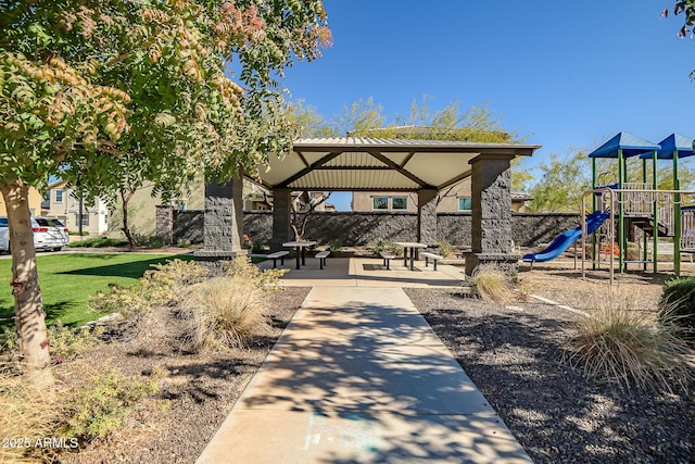 view of property's community featuring a playground