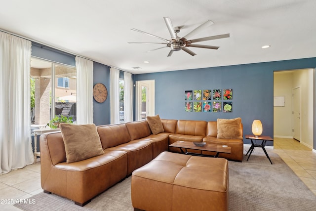 living room featuring light tile patterned flooring, ceiling fan, and recessed lighting