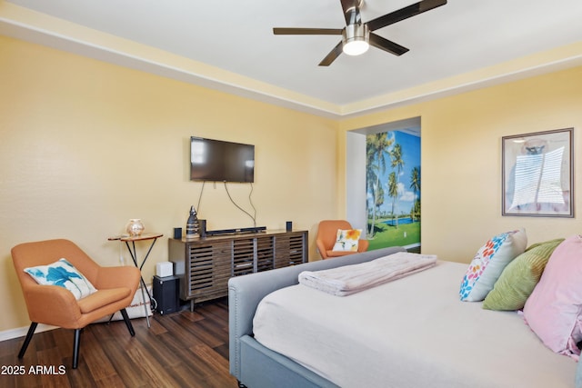 bedroom featuring wood finished floors and ceiling fan