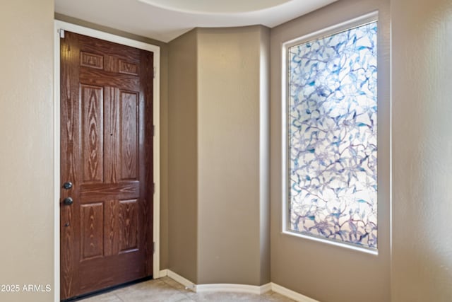 entrance foyer with baseboards