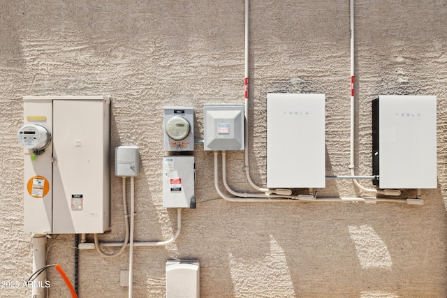 utility room with electric meter
