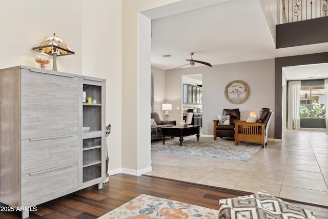 entrance foyer with wood finished floors and baseboards