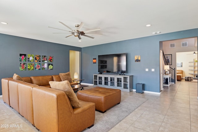 living room featuring a ceiling fan, recessed lighting, light tile patterned flooring, and baseboards