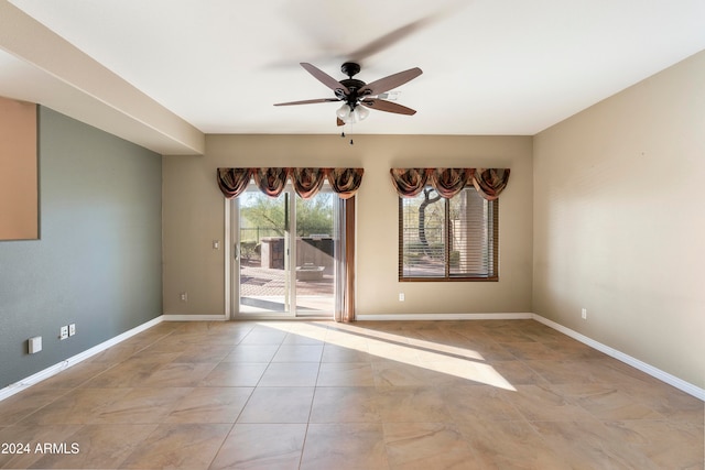 spare room featuring ceiling fan