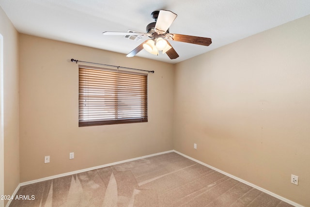 carpeted empty room with ceiling fan