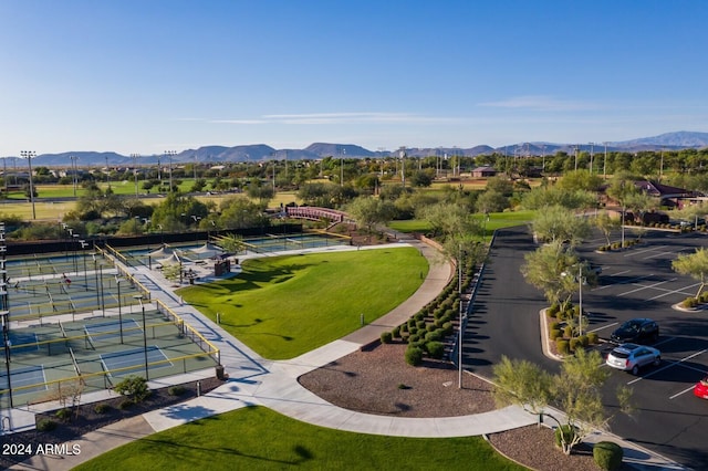 birds eye view of property with a mountain view