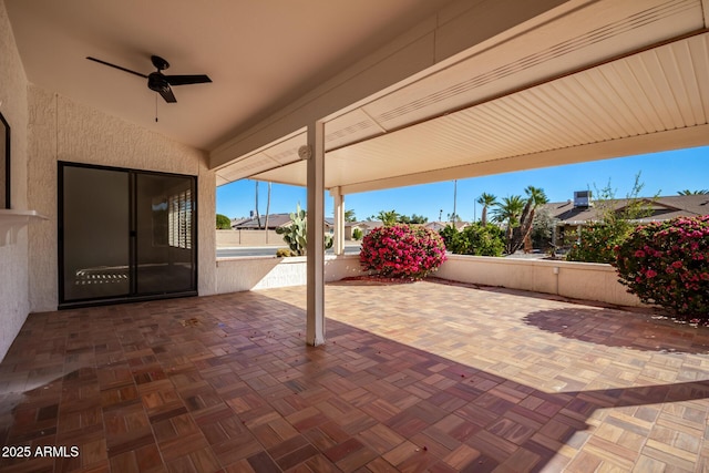 view of patio with ceiling fan