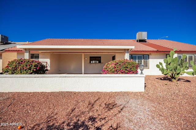 view of front of house featuring central AC unit