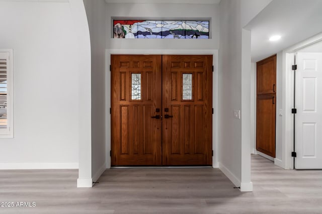 entrance foyer featuring light wood-type flooring