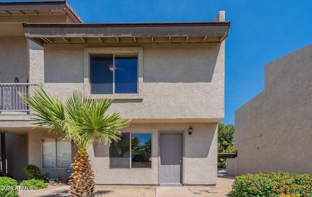 19601 N 7th St Unit 1003, Phoenix, AZ 85024 - rear view of property featuring stucco siding