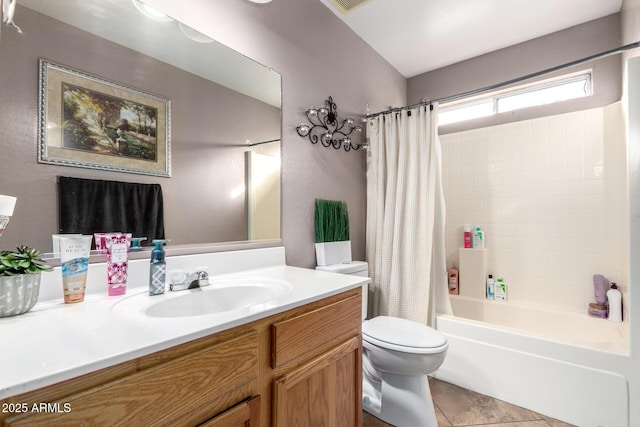 full bathroom featuring toilet, shower / tub combo, vanity, and tile patterned floors