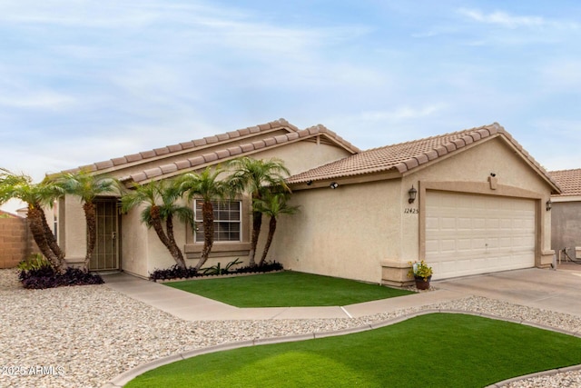 view of front facade with a front yard and a garage