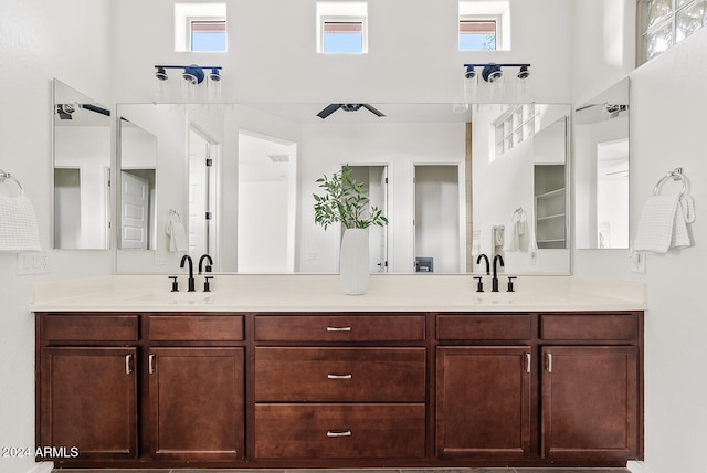 bathroom with a healthy amount of sunlight and vanity