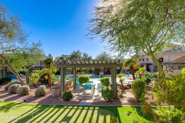 exterior space with a patio and a pergola