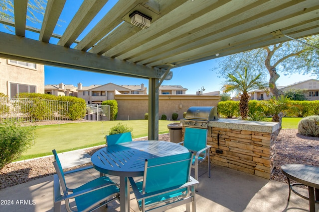 view of patio with an outdoor kitchen