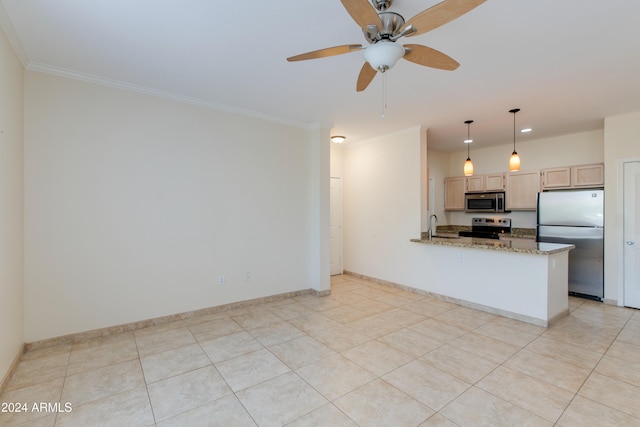 kitchen with light stone counters, crown molding, kitchen peninsula, and stainless steel appliances