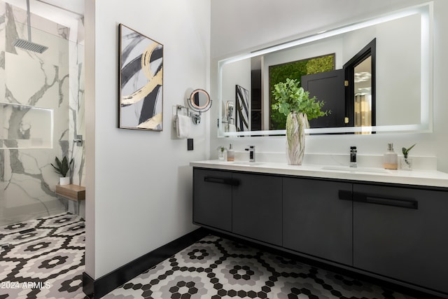 bathroom with tile floors and double sink vanity