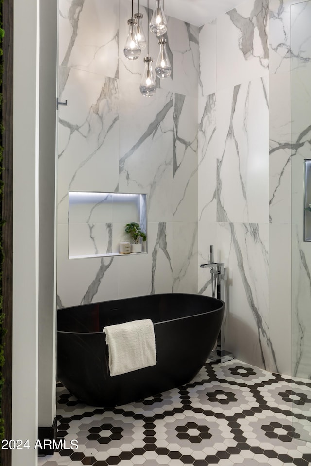 bathroom featuring tile walls and tile floors