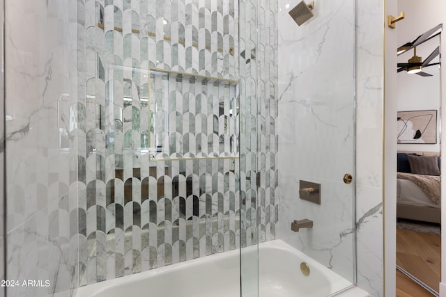 bathroom with tiled shower / bath combo