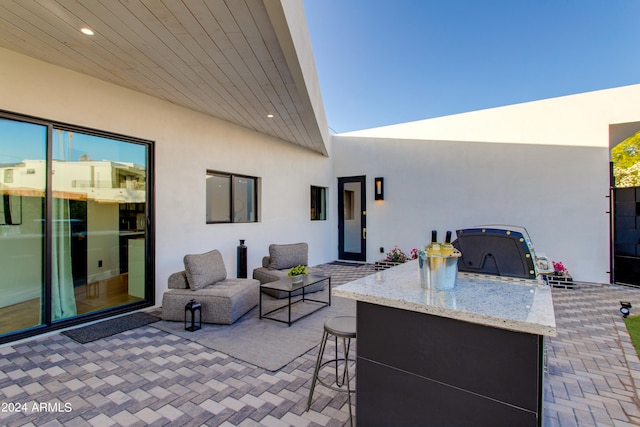 view of patio / terrace with a bar