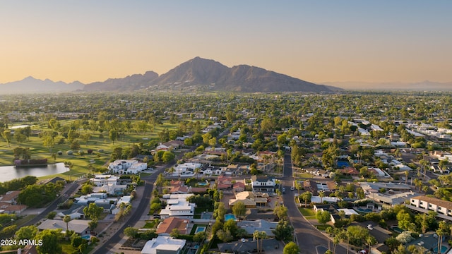 aerial view at dusk with a mountain view