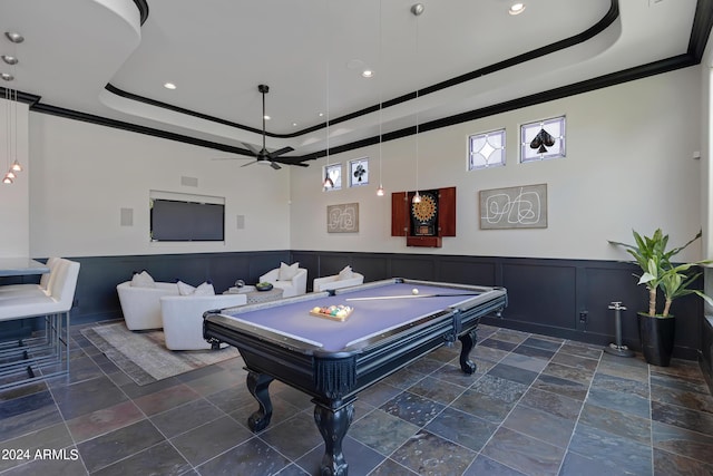 rec room featuring ceiling fan, ornamental molding, pool table, and a tray ceiling