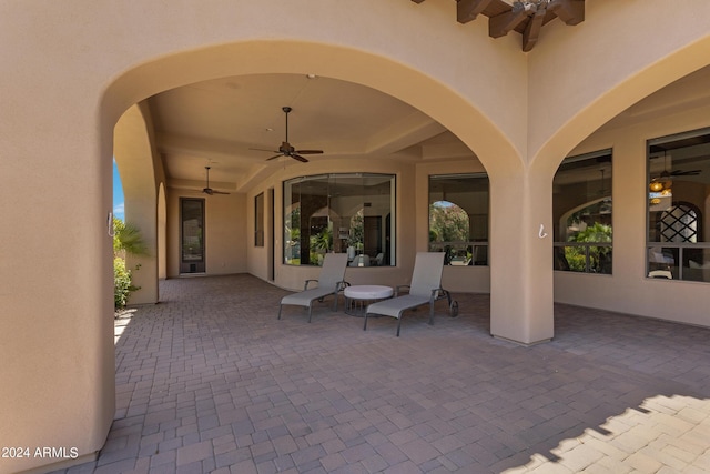 view of patio / terrace featuring ceiling fan