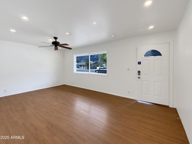 entrance foyer with recessed lighting, ceiling fan, baseboards, and wood finished floors