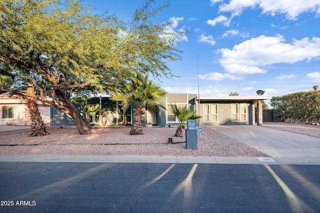 view of front of home featuring a carport