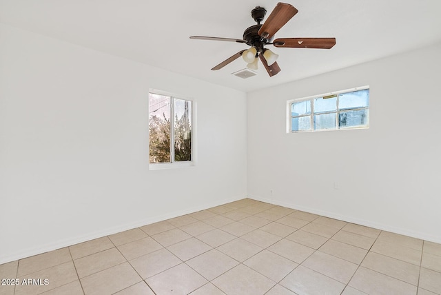 unfurnished room featuring ceiling fan