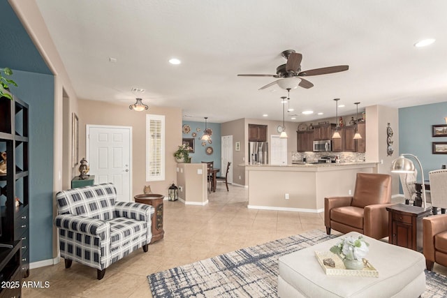 living area with light tile patterned floors, recessed lighting, and visible vents